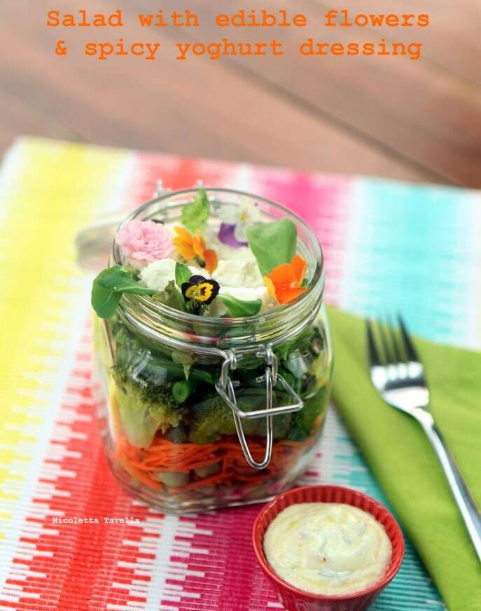 Easy salad with edible flowers and spicy yoghurt dressing
