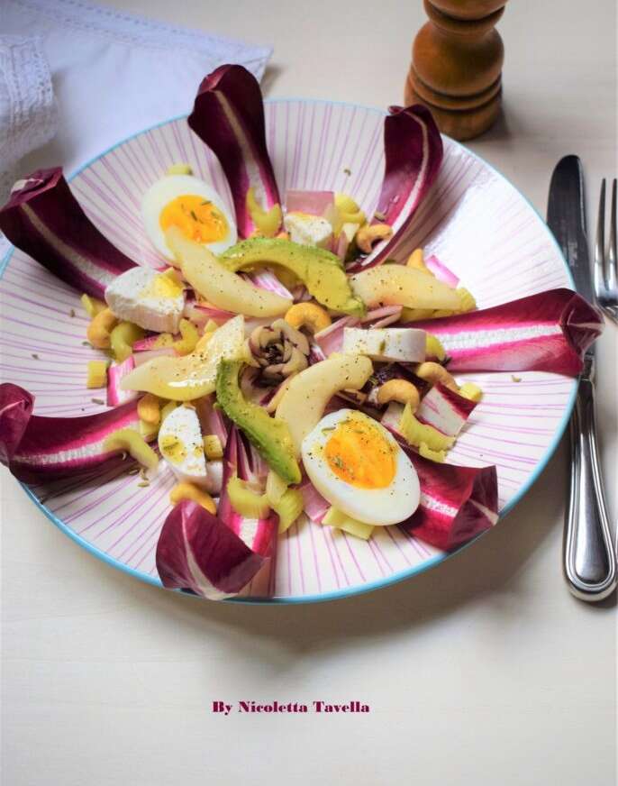 Easter salad with radicchio, pear, cashews and avocado