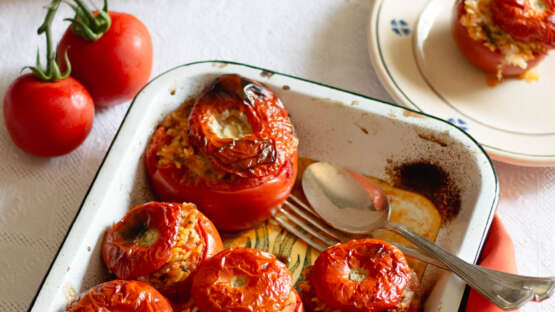Tomatoes stuffed with rice, cheese and herbs