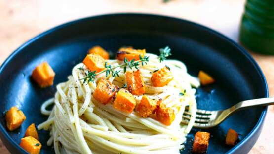Spaghetti cacio e pepe with roasted squash and thyme